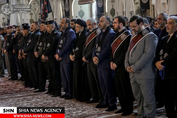 تصاویری از پرچم عزای حسینی بر فراز گنبد ائمه(ع) در عراق