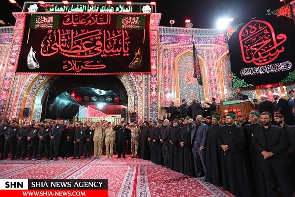 تصاویری از پرچم عزای حسینی بر فراز گنبد ائمه(ع) در عراق