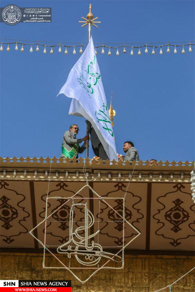 پرچم گنبد حرم امیر المؤمنین (علیه السلام) تعویض شد +تصاویر