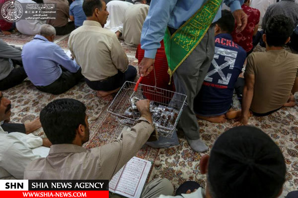 توزیع روزانه ۳۰۰۰ بسته افطاری میان زائران حرم امیرالمومنین(ع) + تصاویر