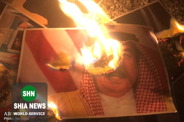 آتش زدن عکسهای ترامپ و حمد بن عیسی در بحرین آتش زدن عکسهای ترامپ و حمد بن عیسی در بحرین