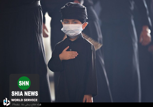 عزادار خردسال حسینی در کربلا