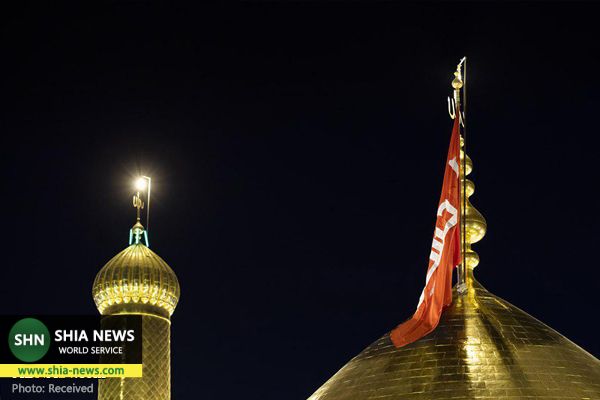 تعویض پرچم گنبد امام حسین(ع) به مناسبت فرا رسیدن ماه ربیع الاول