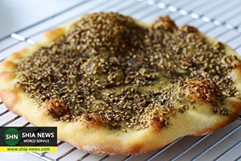 طرز تهیه نان زعتر لبنانی با پنیر خامهای طرز تهیه نان زعتر لبنانی با پنیر خامهای