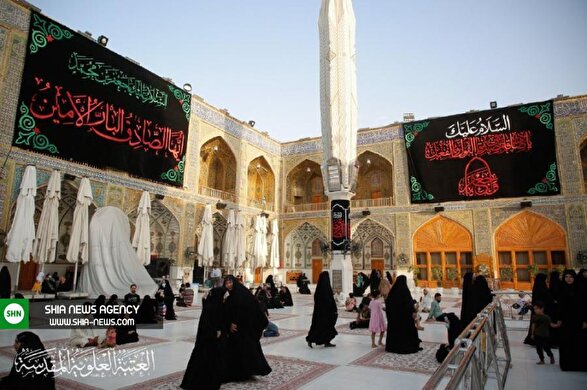 اهتزاز پرچم سیاه مزین به نام یا جعفرصادق(ع) بر بارگاه مطهر علوی