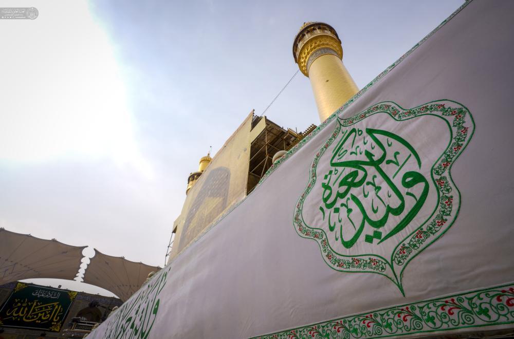 برافراشتن پرچم«محمد و علی قدوتنا» در نجف اشرف+ تصاویر