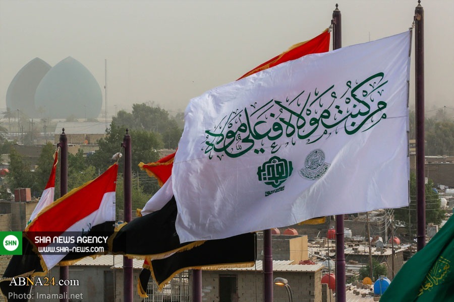 تصاویر/ برافراشته شدن پرچم غدیر در شهر بغداد