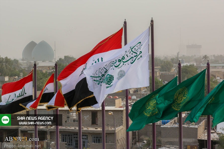 تصاویر/ برافراشته شدن پرچم غدیر در شهر بغداد