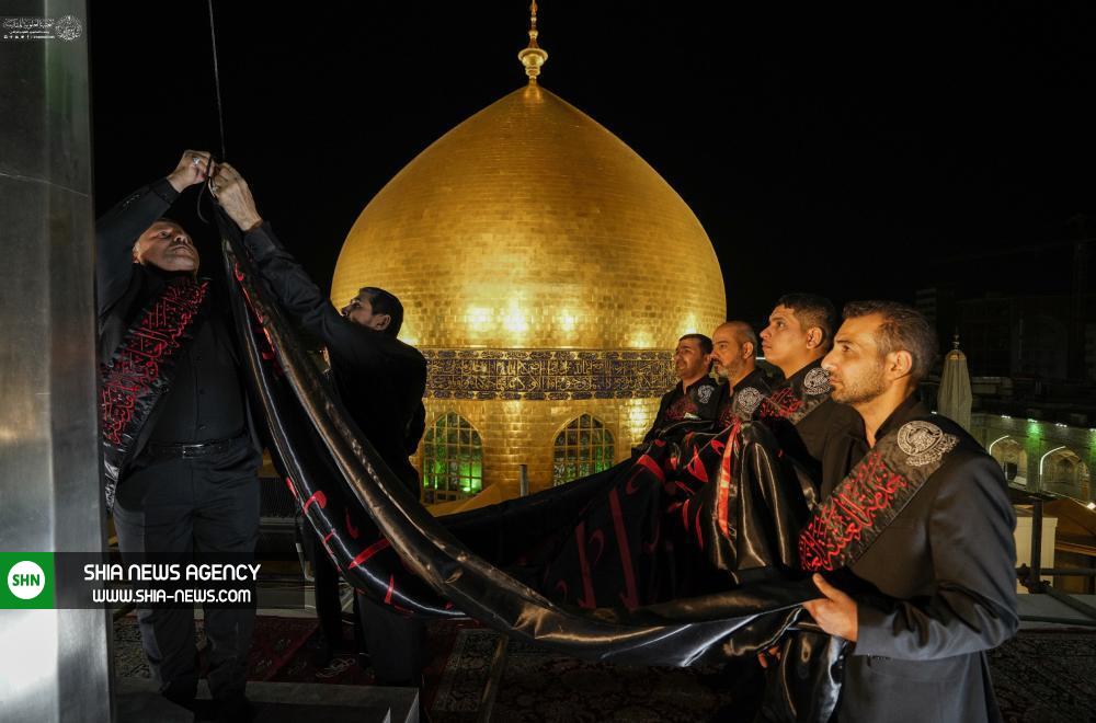 اهتزاز پرچم «فزت و رب الکعبه» در حرم امیرالمومنین(ع)+ تصاویر