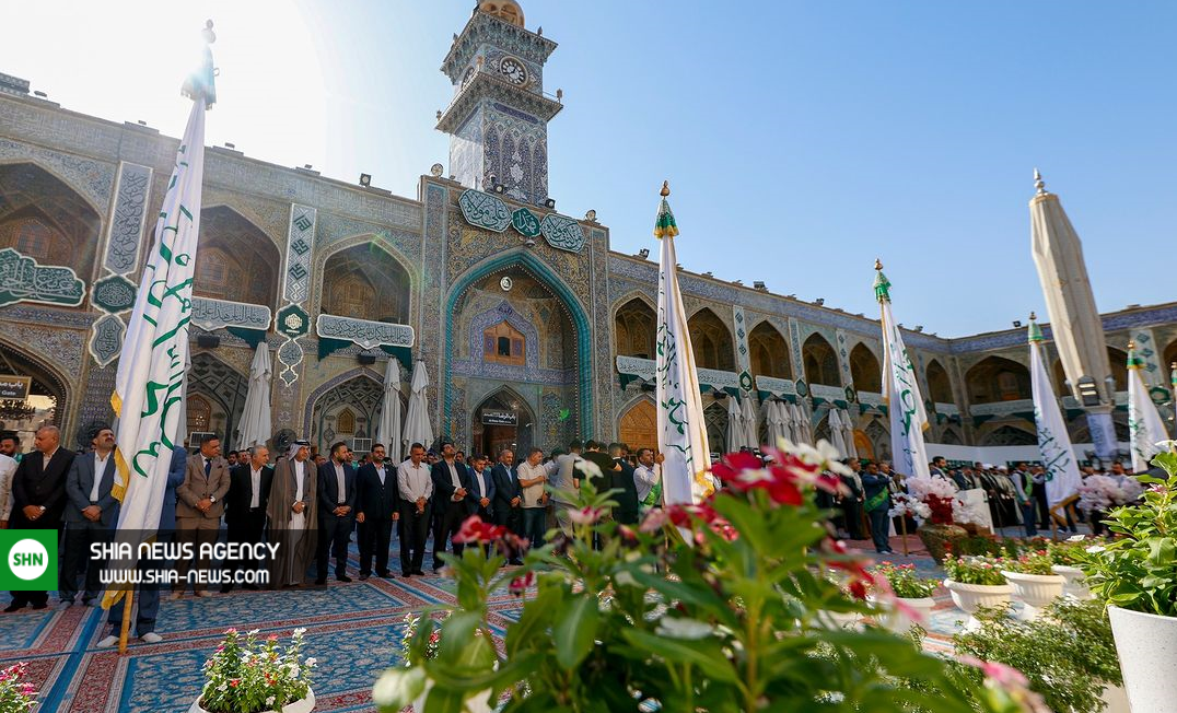 نصب پرچم «من کنت مولاه فهذا علی مولاه» بر فراز ایوان نجف+ تصاویر نصب پرچم «من کنت مولاه فهذا علی مولاه» بر فراز ایوان نجف+ تصاویر