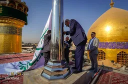 برافراشتن پرچم میلاد پیامبر اکرم(ص) در حرم امیرالمومنین(ع)